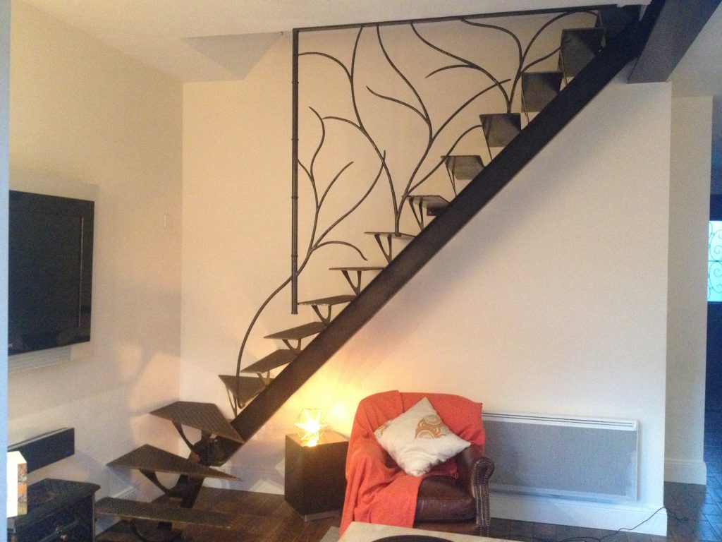 Escalier limon central 1/4 tournant