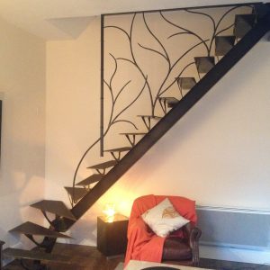 Escalier limon central 1/4 tournant