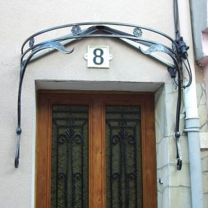 Marquise art nouveau et sa grille